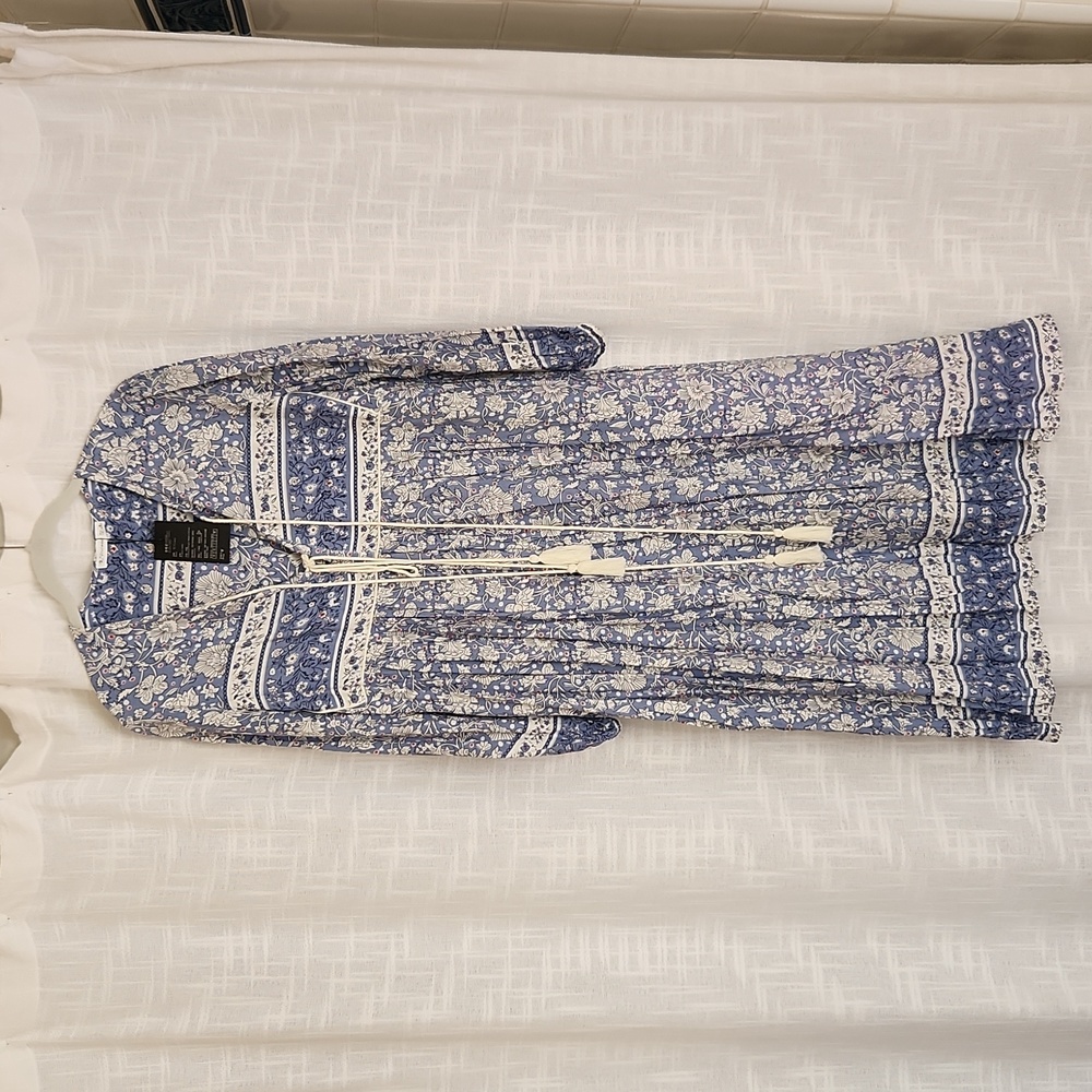 Cotton dress with tassles